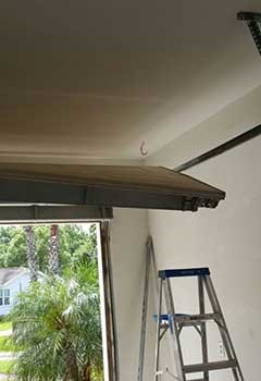 Garage Door Off Track Service Lesslie